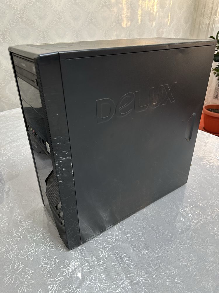 Процессор Delux.
