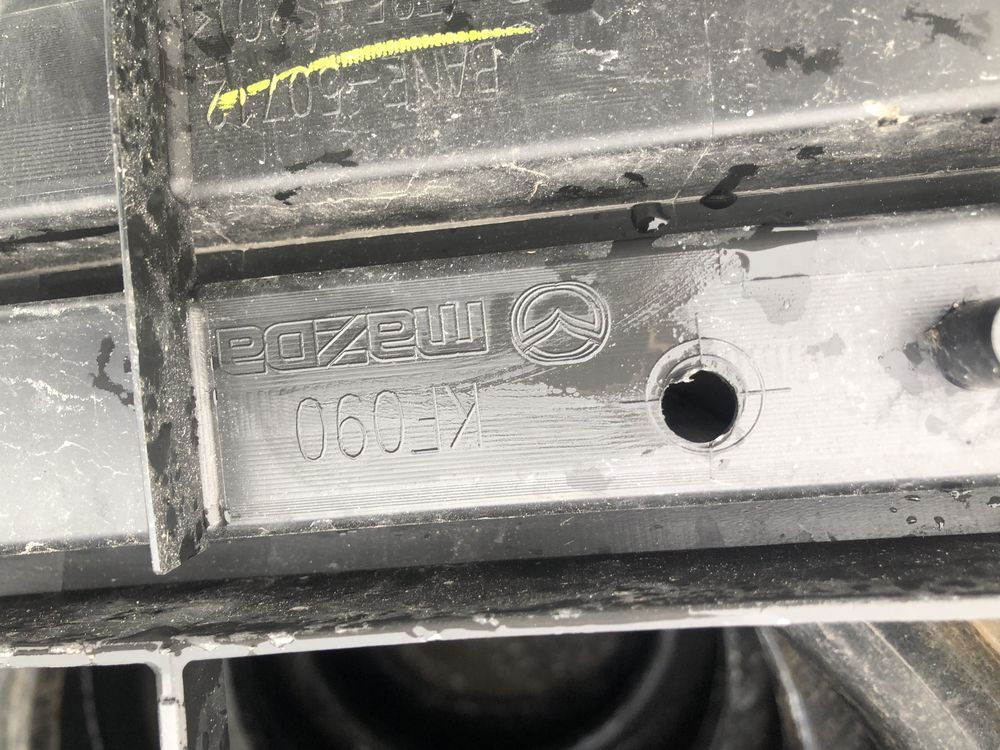 Решетка Mazda 2 4