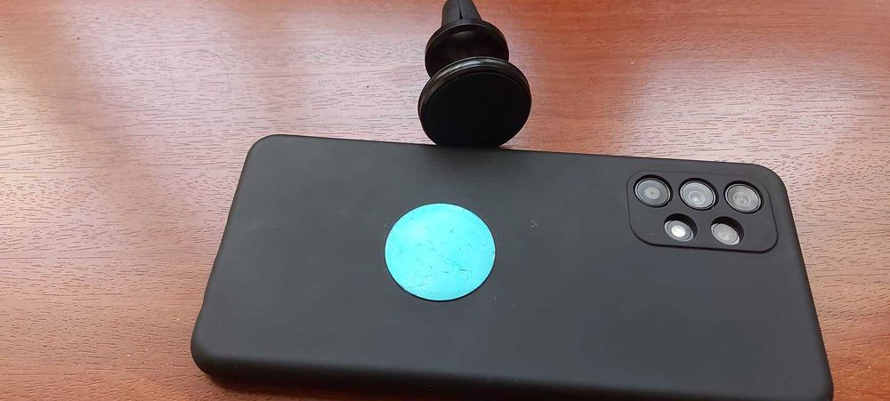 Подвижна магнитна поставка за телефон