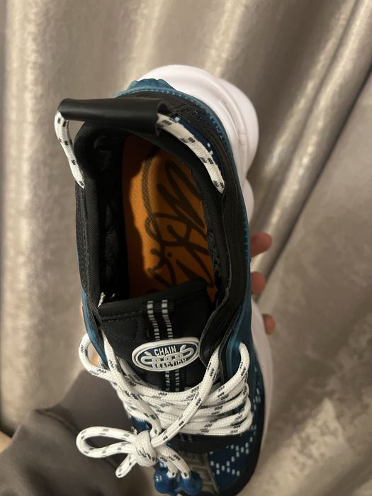 Versace chain reaction