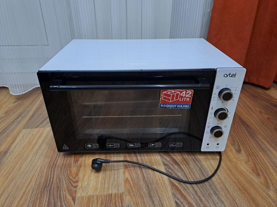Продам духовую печь artel