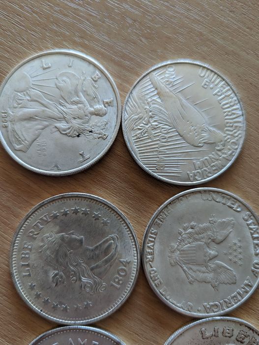 Монети one dollar