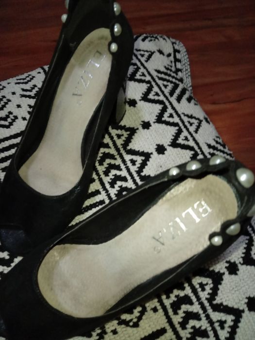 Обувки на висок ток