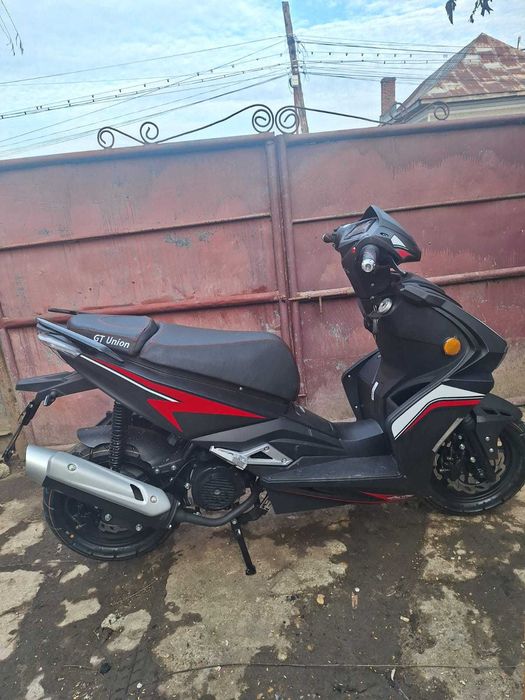 Scutere 125 cc se vine nou 0 kilometri acept schimb cu atv