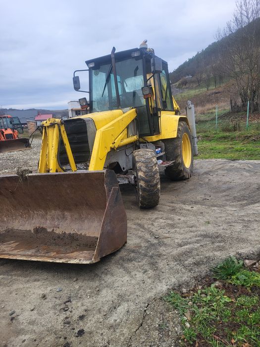 Vand buldoexcavator mf 750