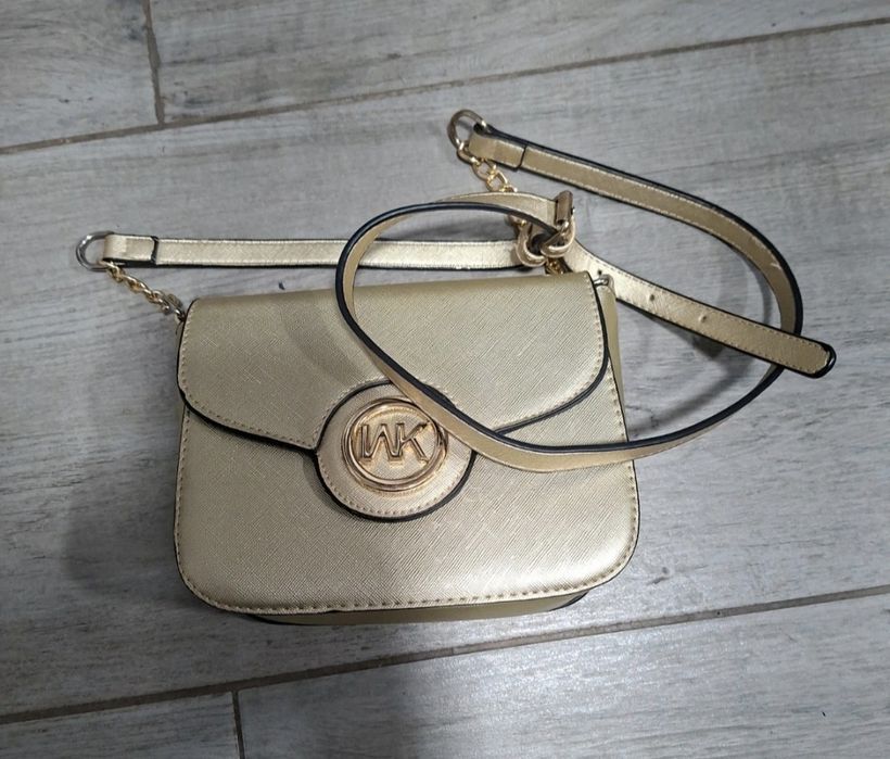 Geantă aurie de mana