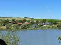 Teren pe malu lacului Geaca- 2000 M  intravilan -comuna Geaca jud Cluj