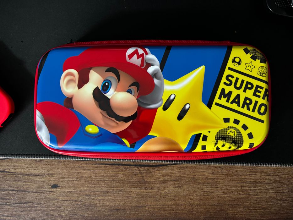 Consola Nintendo Switch (Husa, 2 Joycon-uri extra + suport Joycon-uri)
