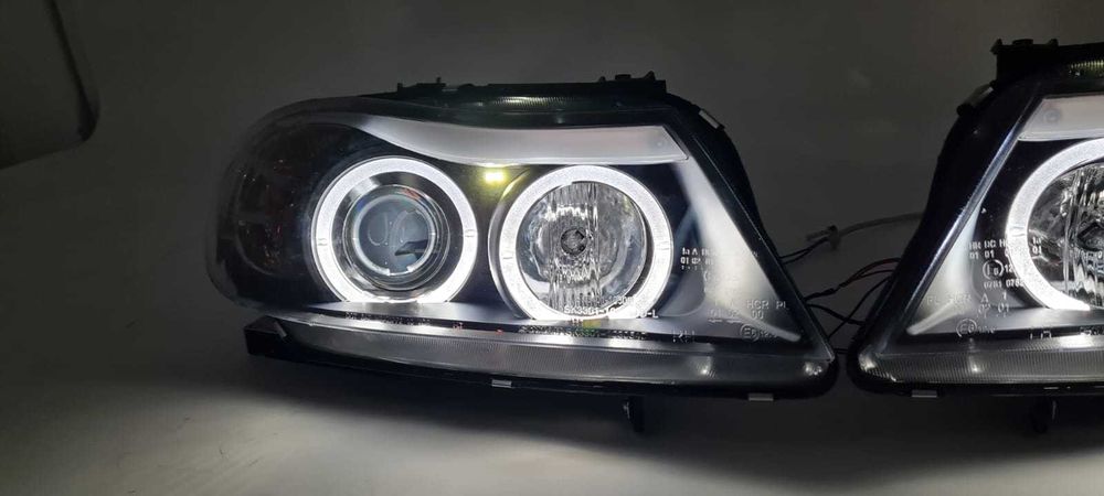 9. Faruri BMW Seria 3 E90 E91 (2005-2008) Angel Eyes Garantie 12luni