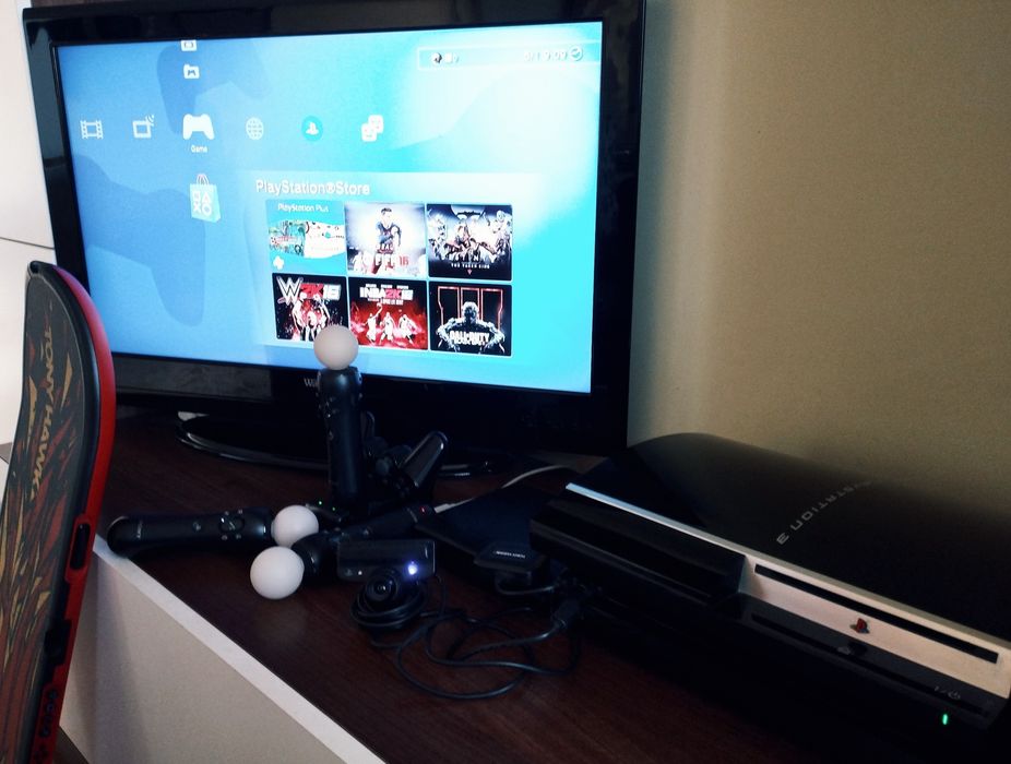 Consola PlayStation 3 + accesorii + 40 jocuri