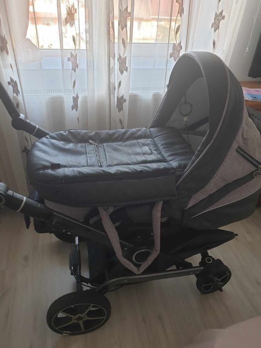 Vând Căruț 2 in1 conține landou, umbrela si geanta.. scaun de masa..