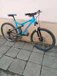 Bicicletă full suspensii