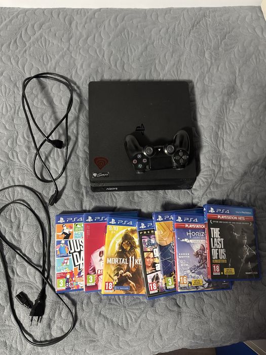 PlayStation 4 873 GB + 7 jocuri originale – stare foarte bună