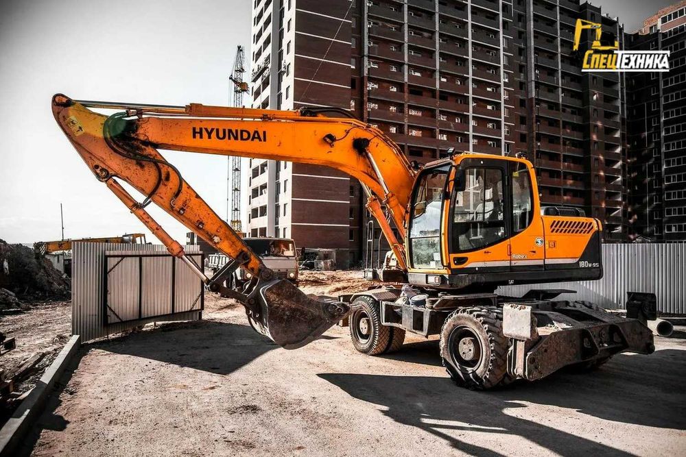 Услуги колёсных экскаватор СКИДКА гидромолот ямобур Астана  аренда