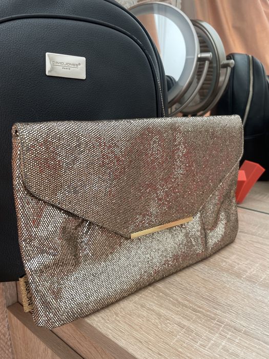 Продам сумочку золотистую