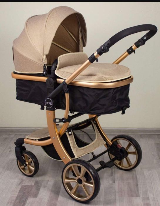 КОЛЯСКА ТРАНСФОРМЕР 2 В 1 золотая рама черный