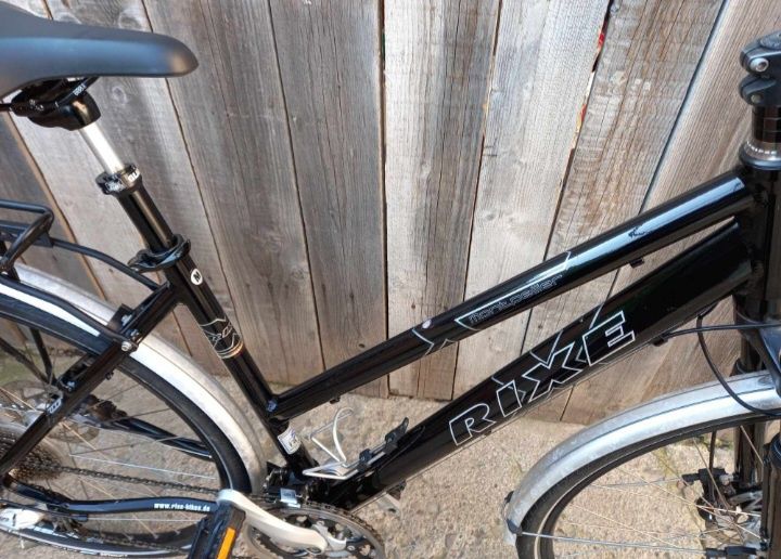 Bicicletă unisex RIXE ca nouă pe 28 hidraulică cadru aluminiu full