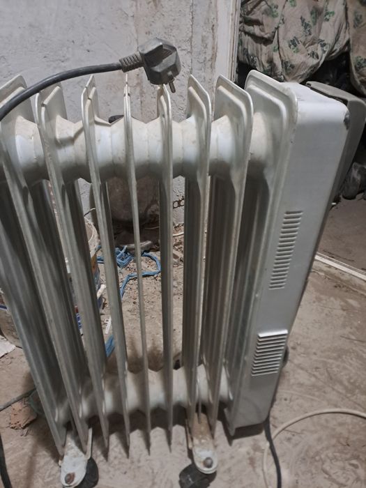 Маслянний обогреватель