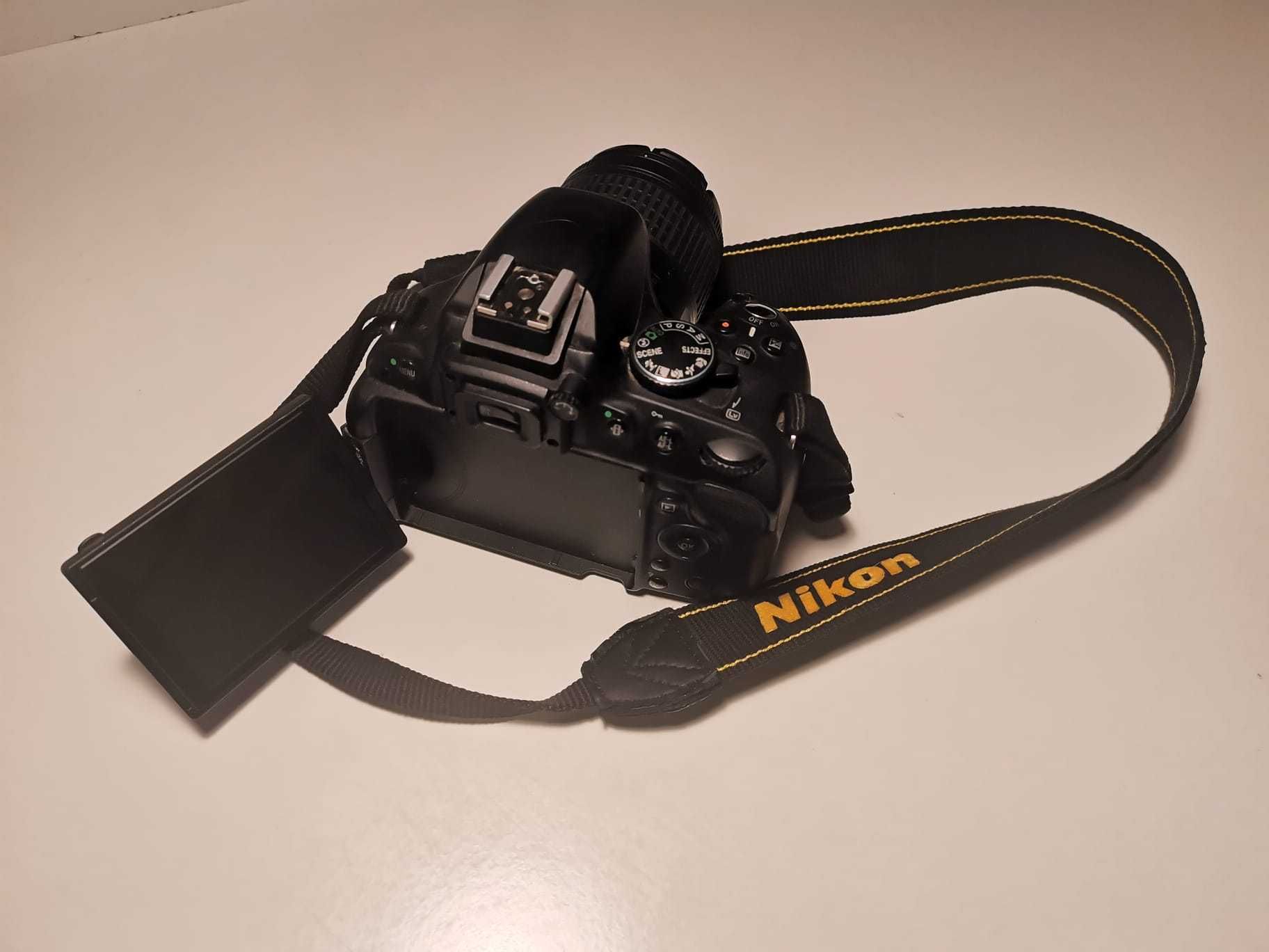 Nikon D5100 + 2 obiective + accesorii – doar 9425 cadre