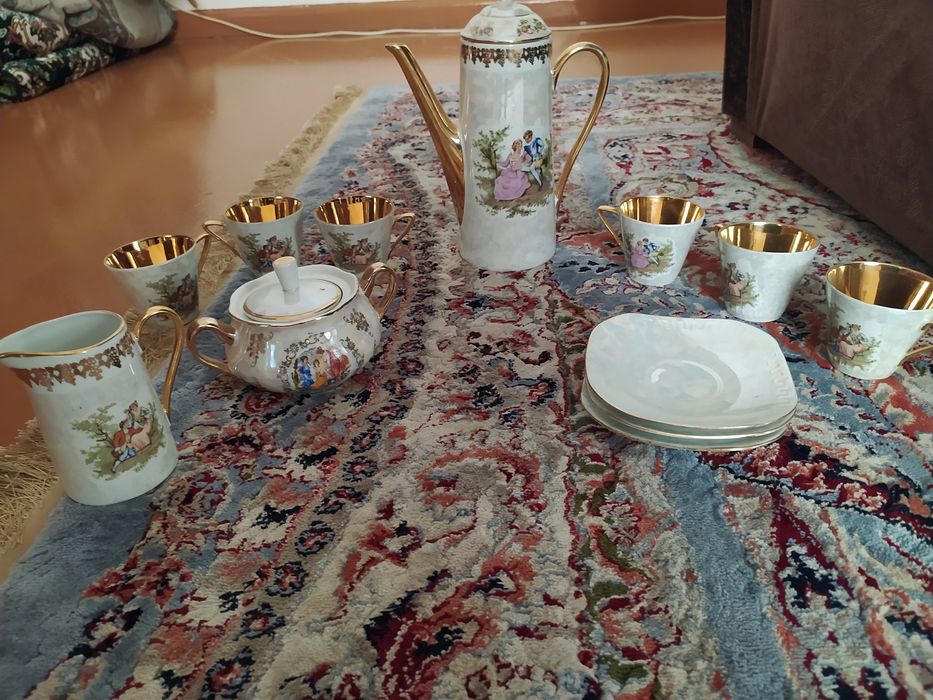 фарфоровый сервис  позолоченный новый не пользованный