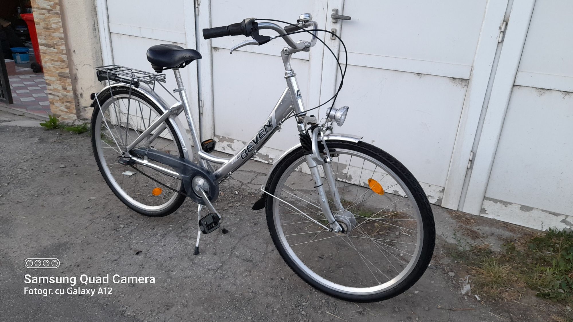 Bicicleta de oraș cu roti de 28 inch cu 7 viteze în butuc aproape noua