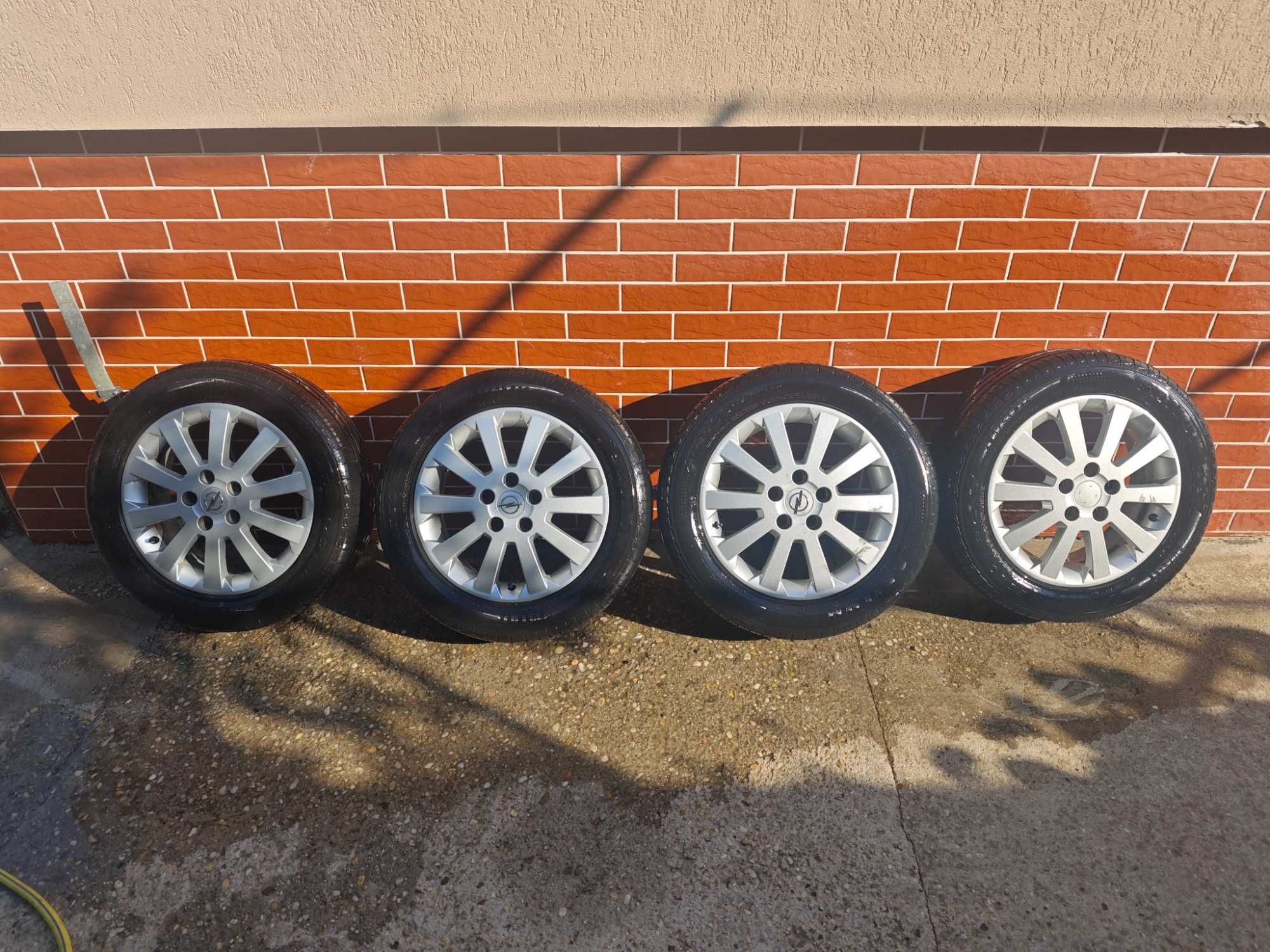 Jante originale Opel 5X110 cu anvelope bonus 240 km/h 91V