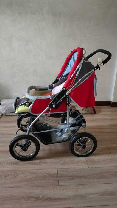 Коляска с амортизаторами