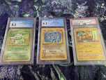 Graded Pokemon cards Pikachu, Bulbasaur, Machamp / Покемон