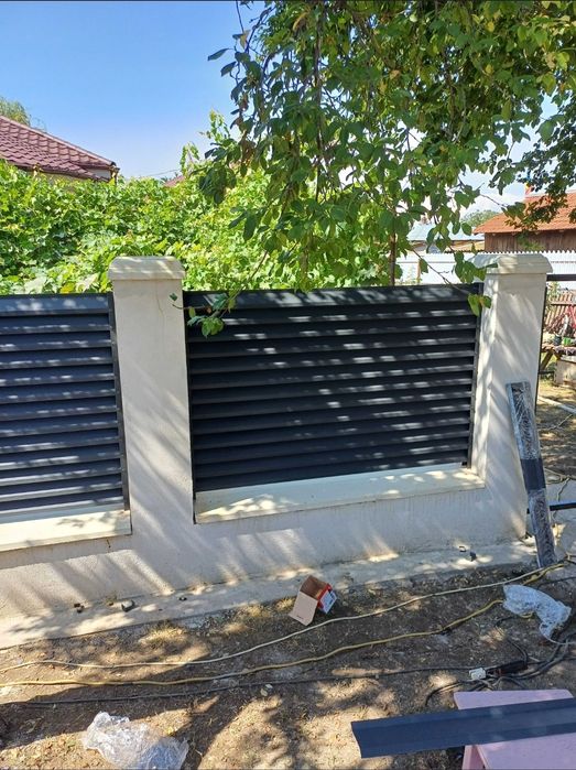 Porti si garduri din sipca metalica