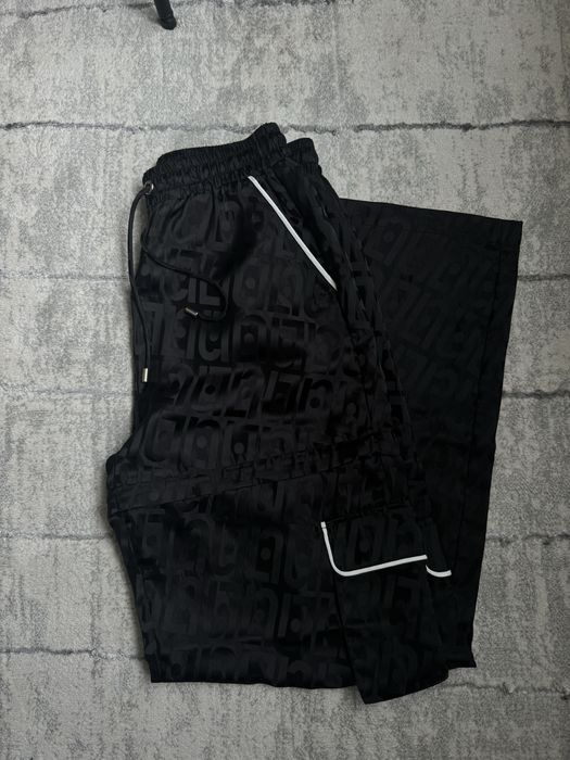 Спортно-елегантен сатенен панталон Liu Jo