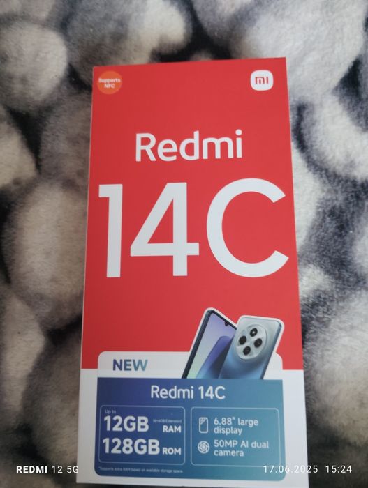 Redmi 14C telefonul este nou in cutie
