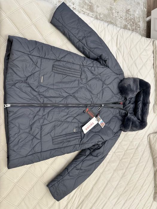 Продам зимнюю куртку новую