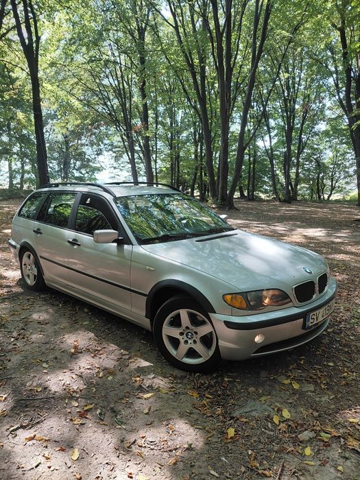 BMW 320d an 2003 150 cai