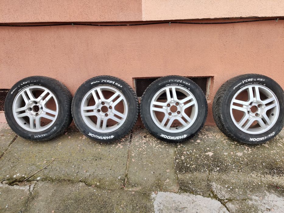 Set roți Ford ,anvelope iarnă+ jante aluminiu R15