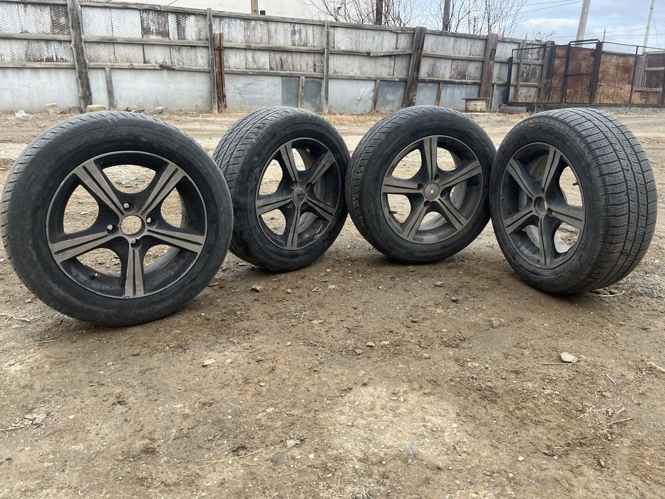 Титан покрышкасымен