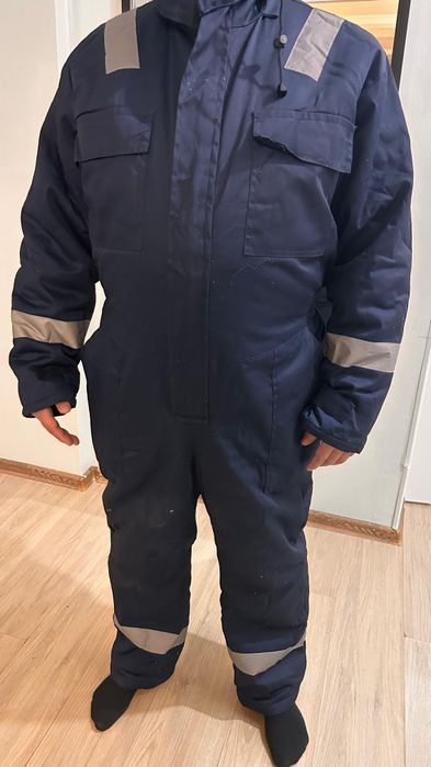 Продам зимний комбинезон  новый