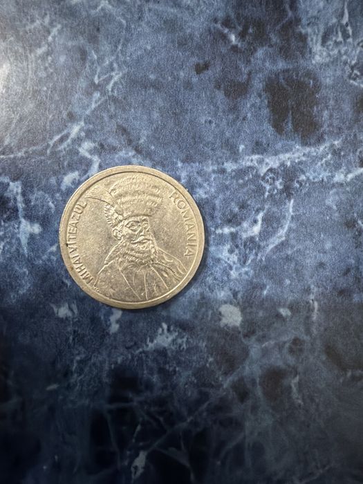 Vand monede vechi de 100 de lei