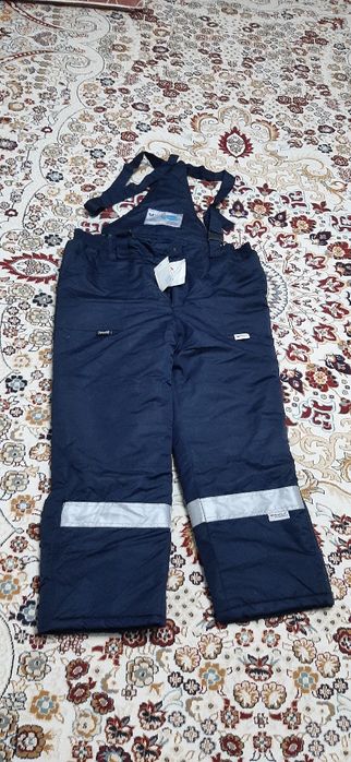 Продам зимние  брюки новые