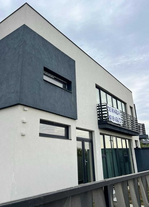 Duplex Otopeni,toate utilitatile,la asfalt,curte generoasa,2 balcoane