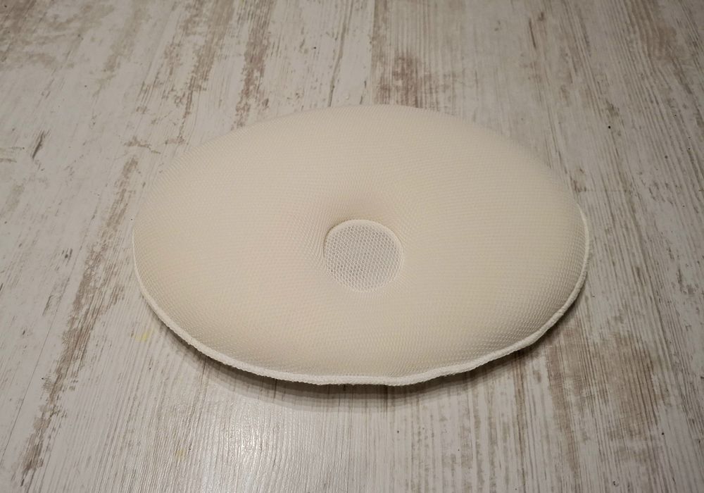 Ергономична бебешка възглавница