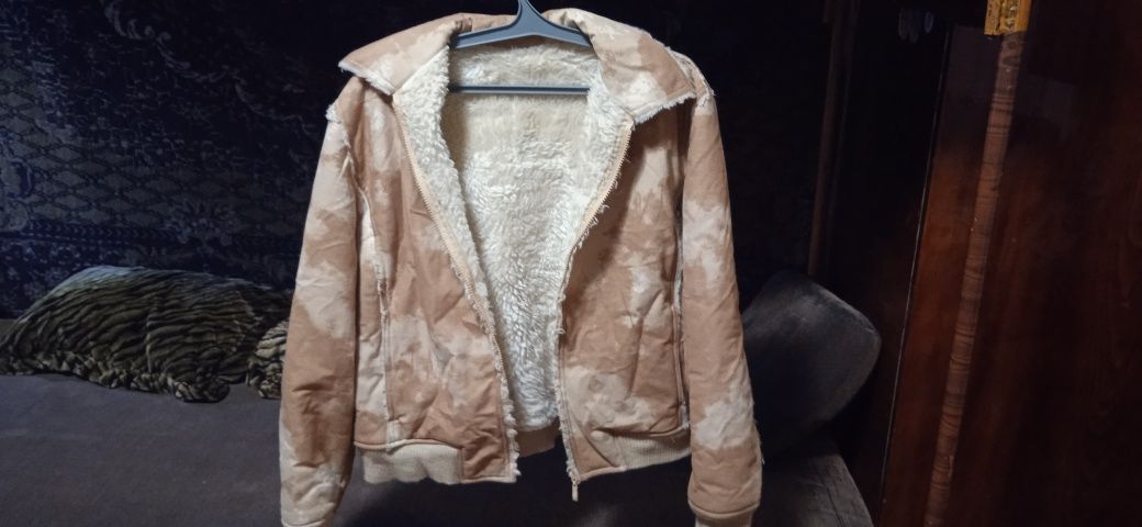 Продам женскую искусственную куртку