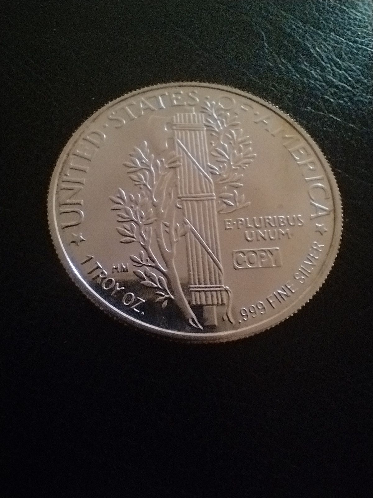 Moneda lingou argint puritate  999 ,1 uncie /