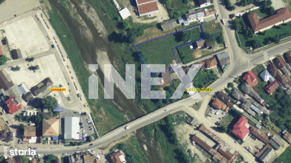 Teren intravilan Domnesti, Central langa Liceu, pe malul Raului