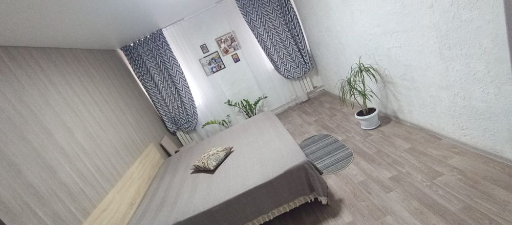 Трёхкомнатная квартира с гаражом и огородом в Красном Партизане