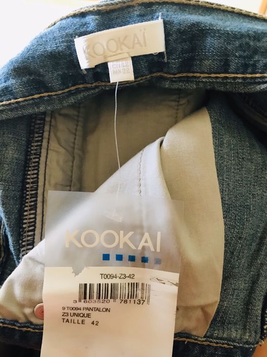 Джинсы- с карманами новые с этикеткой