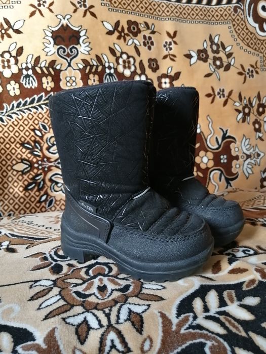 Продам сапоги зимний в отличном состояний.
