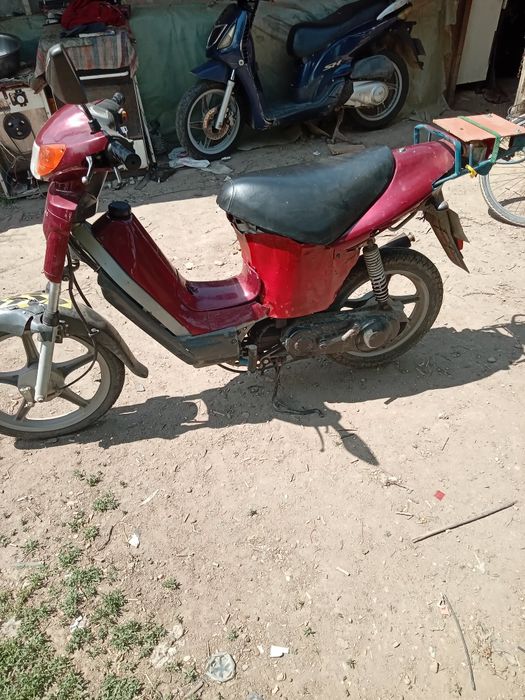 Vand scuter mini suzuki.