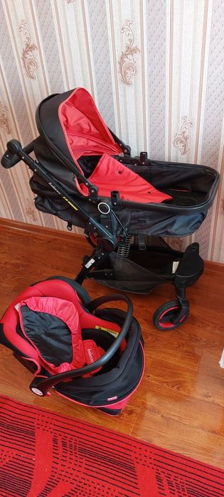 Коляска детская,б/у, черного цвета.