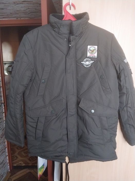 Пуховик на мальчика.