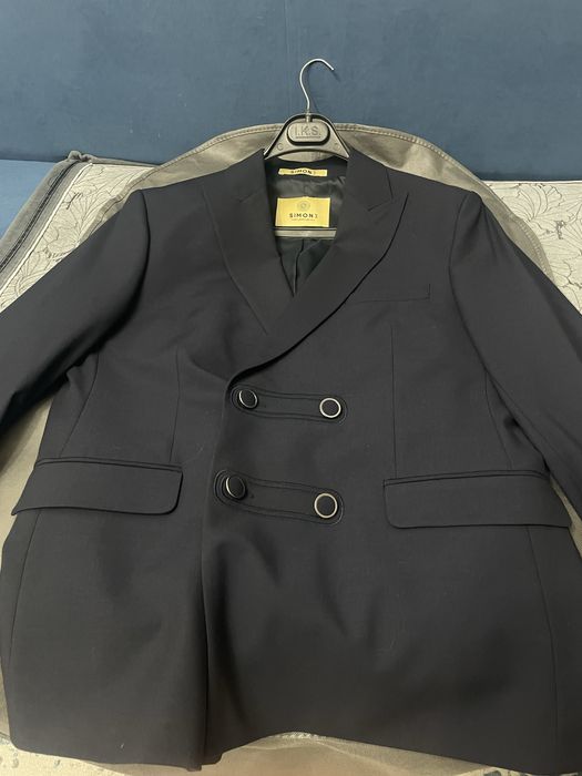 Продам костюм новый